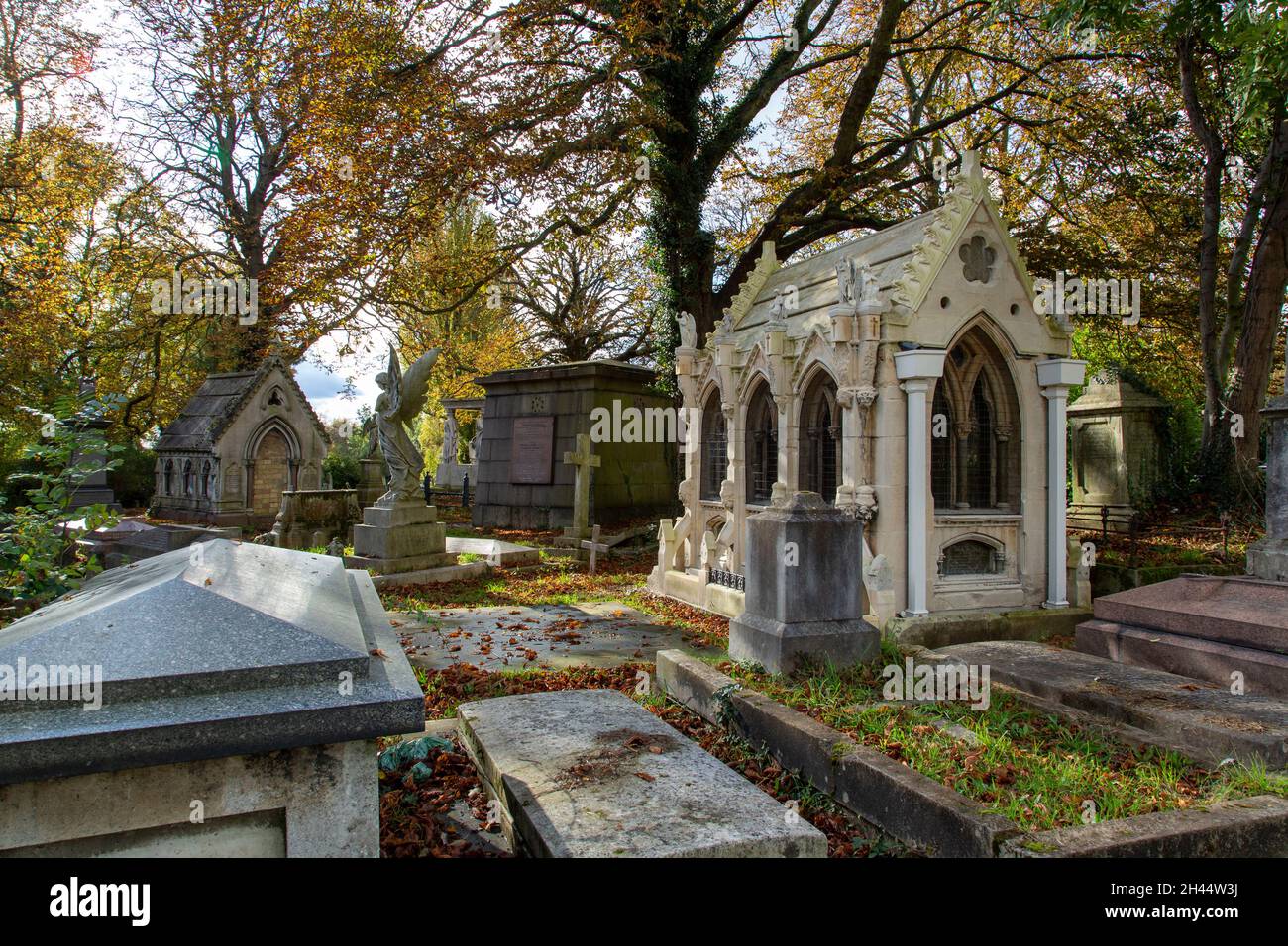 Early nineteenth century gothic monuments at Kensal Green Cemetery, London in the autumn sun Stock Photo