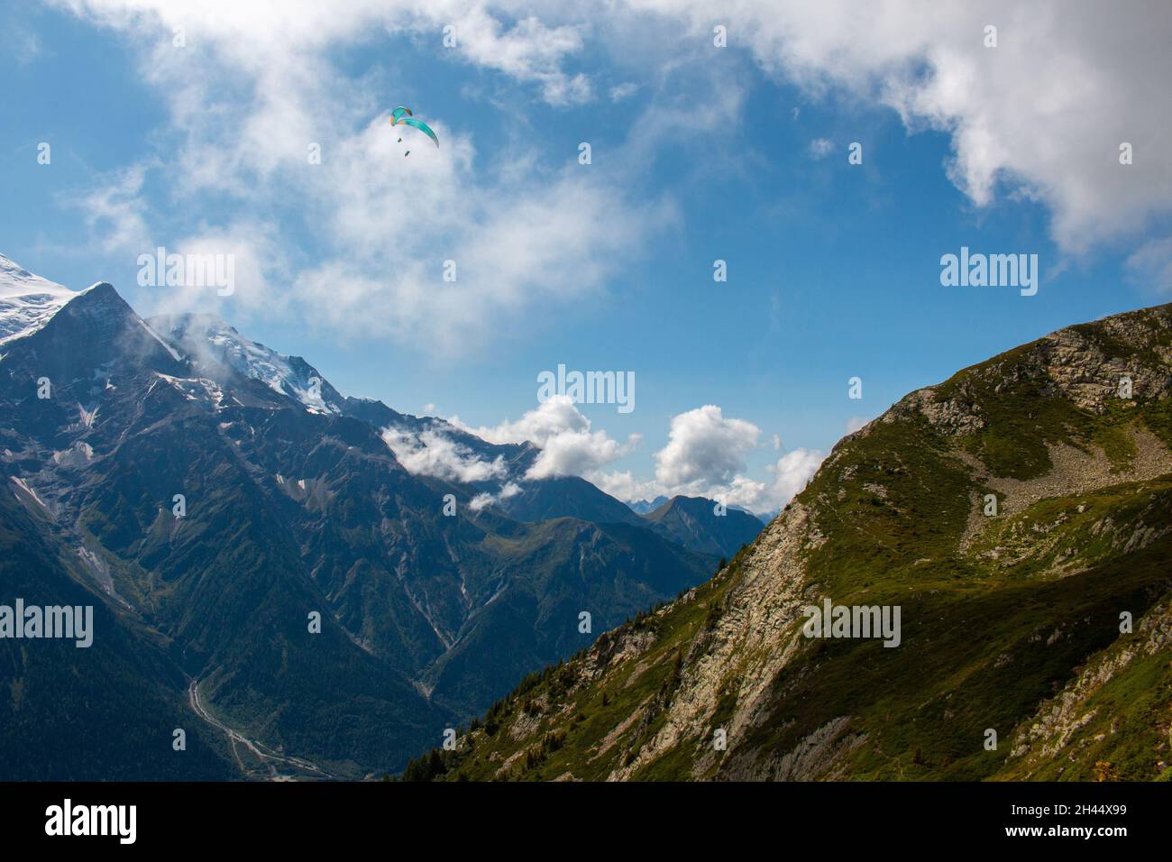 The view from a hiking trail between Refuge de Bellachat and Les Houches (near Chamonix) towards the Massif du Mont Blanc, French Alps. September 2021 Stock Photo
