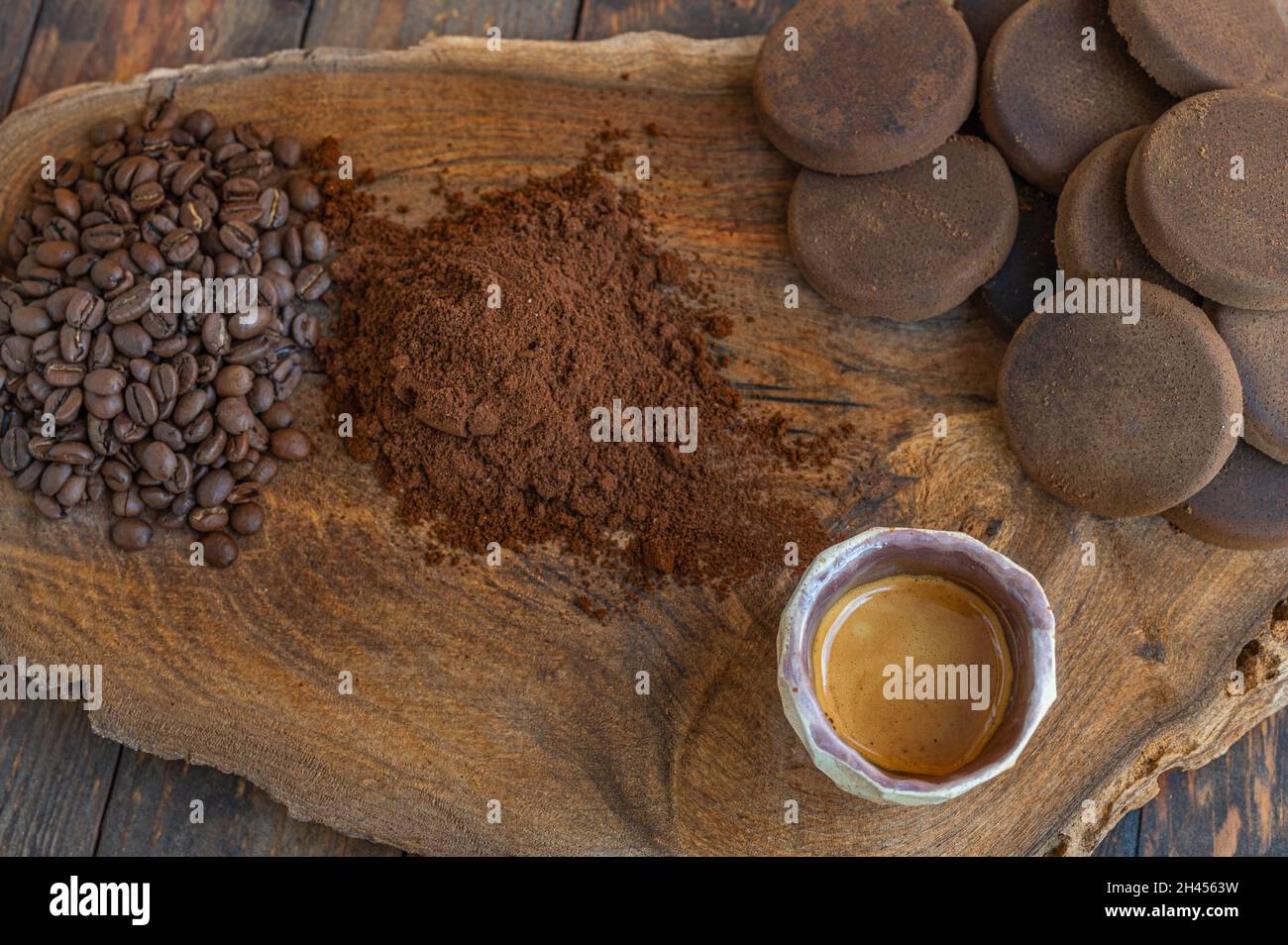 Coffee life cycle from beans, through powder, cup of delicoius espresso