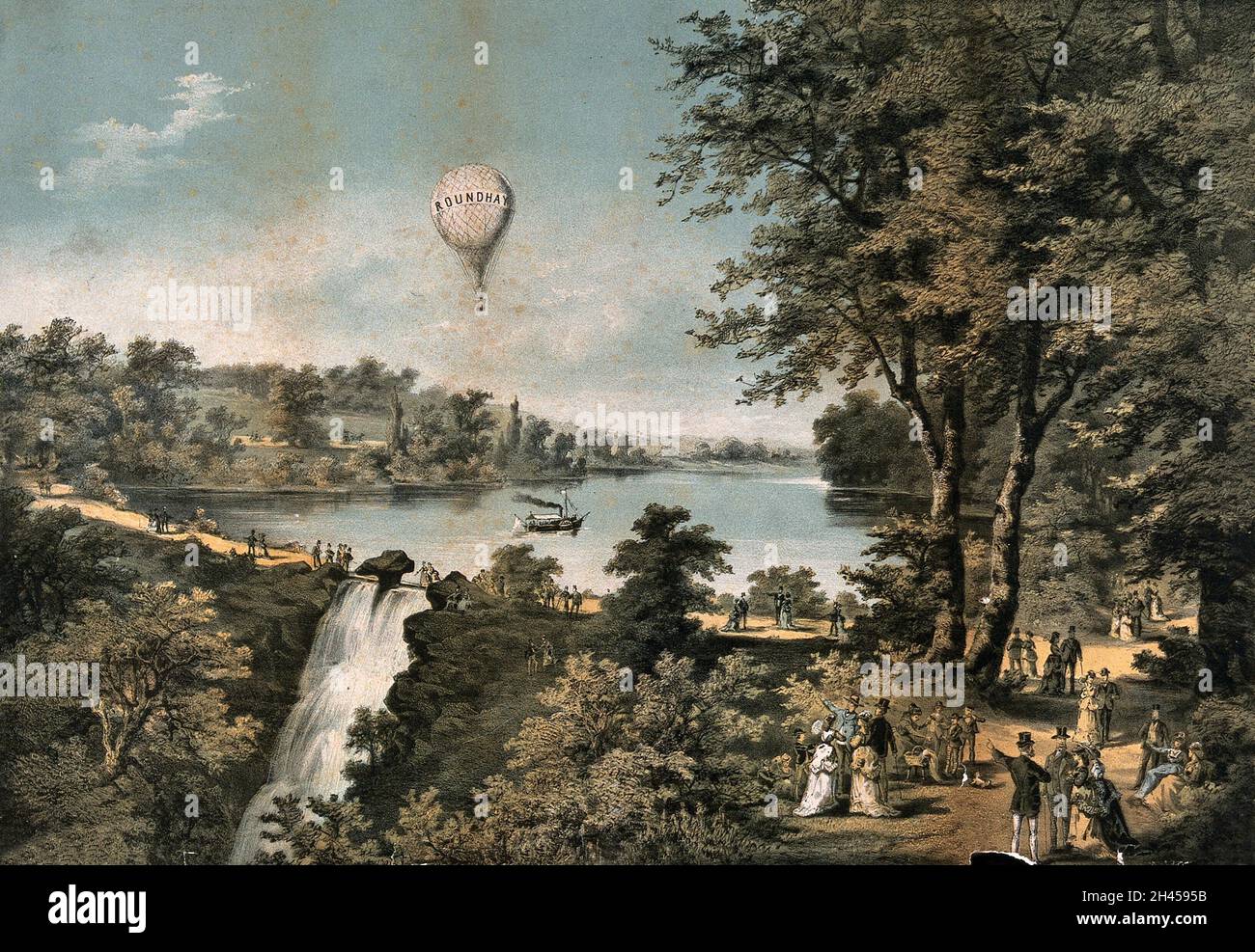 Roundhay Park, Leeds: the balloon 'Roundhay' flies above the park; a paddle-steamer takes passengers across the lake; in the foreground, a cascade. Coloured lithograph. Stock Photo