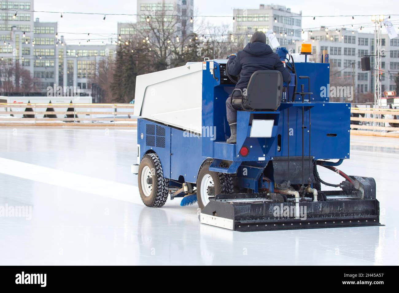 special machine ice harvester cleans the ice rink Stock Photo Alamy