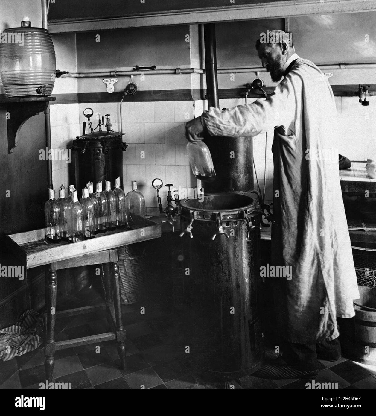 The French microbiologist Louis Pasteur working in the lab. Stock Photo