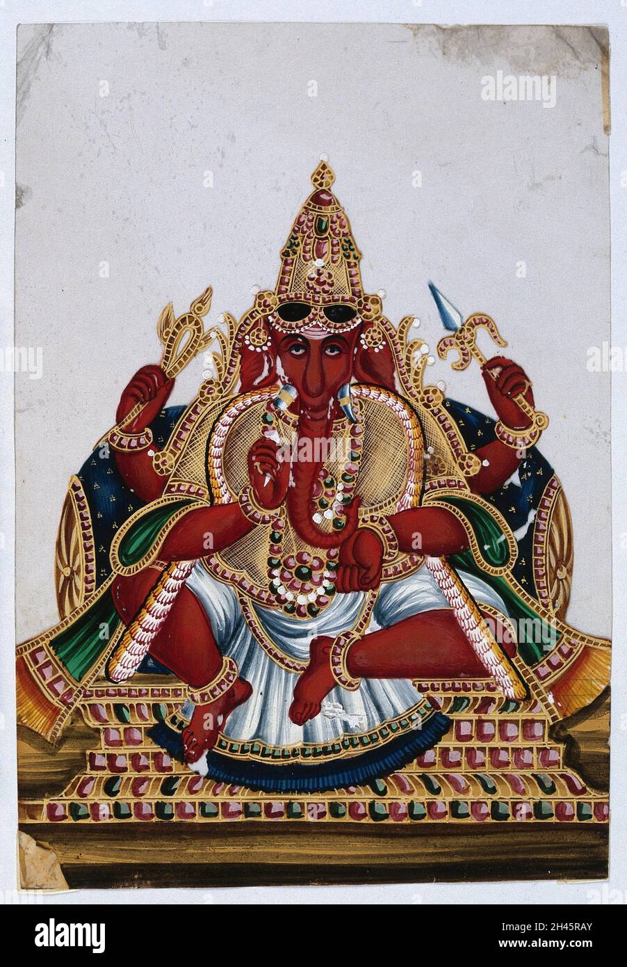 Ganesha, the elephant headed god with four arms. Gouache painting on