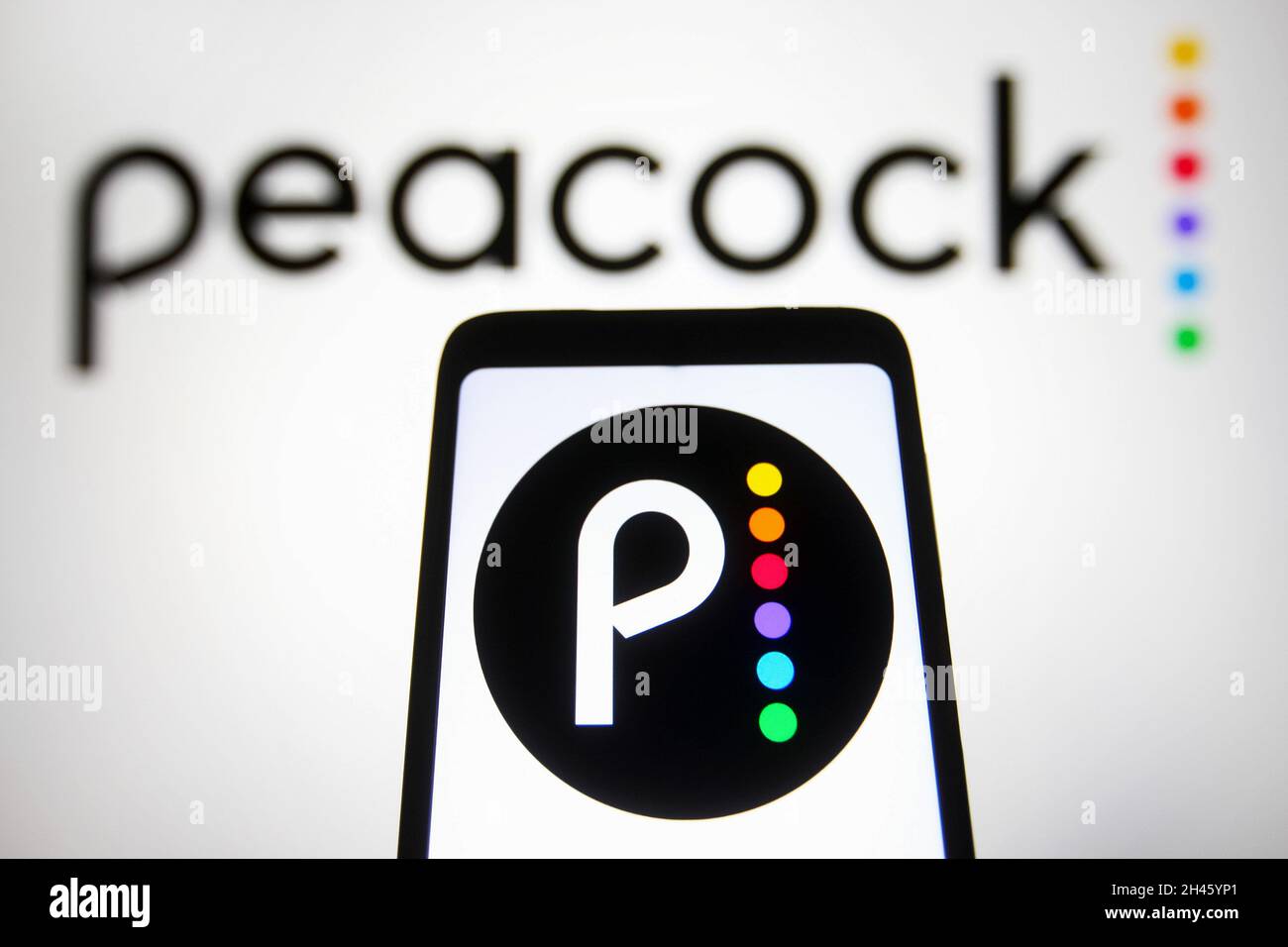 In this photo illustration a Peacock logo of an US video streaming