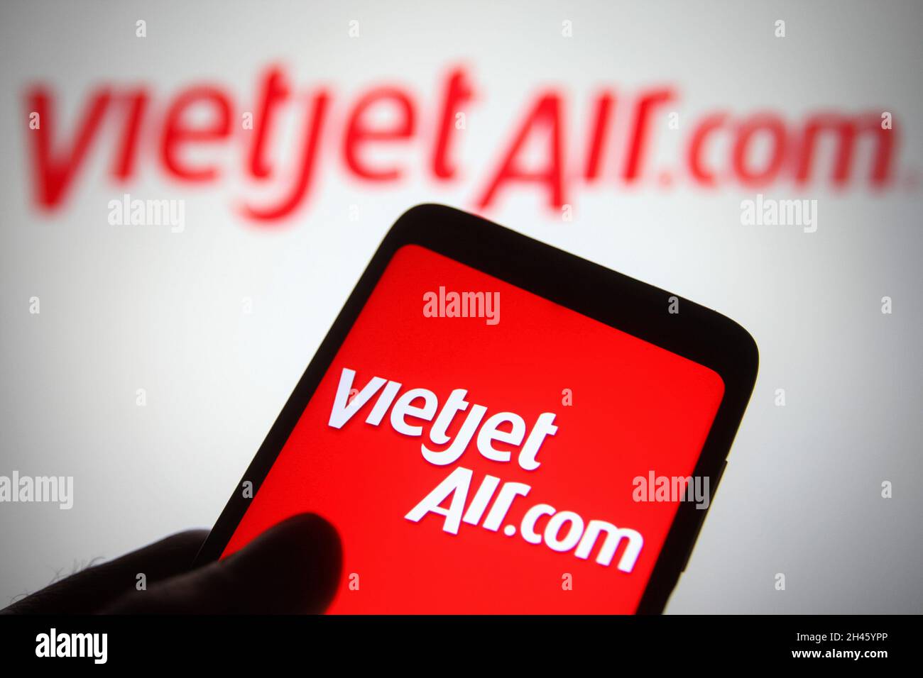 Ukraine. 31st Oct, 2021. In this photo illustration a VietJet Air (VietJet Aviation Joint Stock Company) logo of a Vietnam airline is seen on a smartphone and a pc screen. (Photo by Pavlo Gonchar/SOPA Images/Sipa USA) Credit: Sipa USA/Alamy Live News Stock Photo