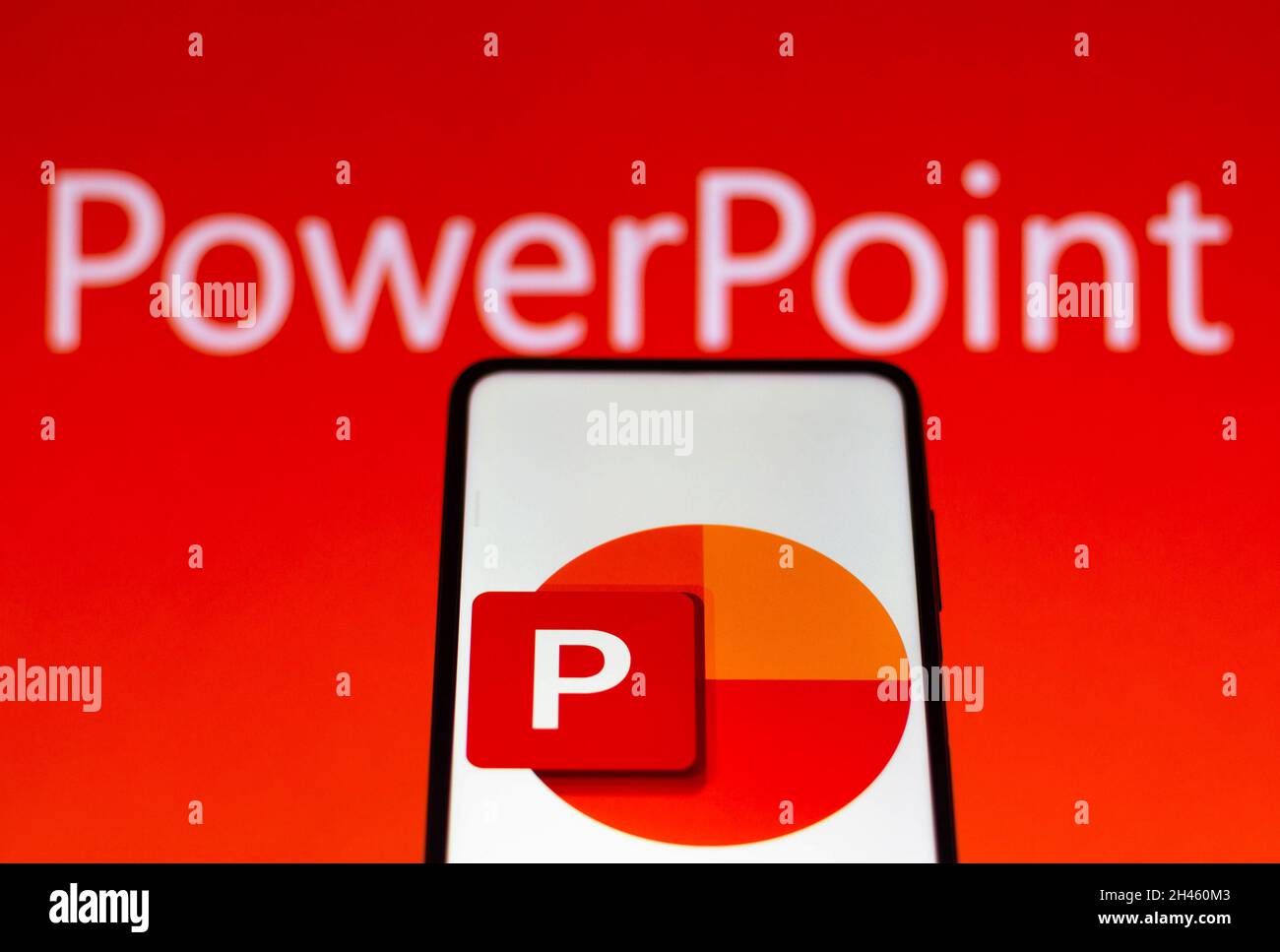 Brazil. 31st Oct, 2021. In this photo illustration the Microsoft PowerPoint logo seen displayed on a smartphone and in the background. Credit: SOPA Images Limited/Alamy Live News Stock Photo
