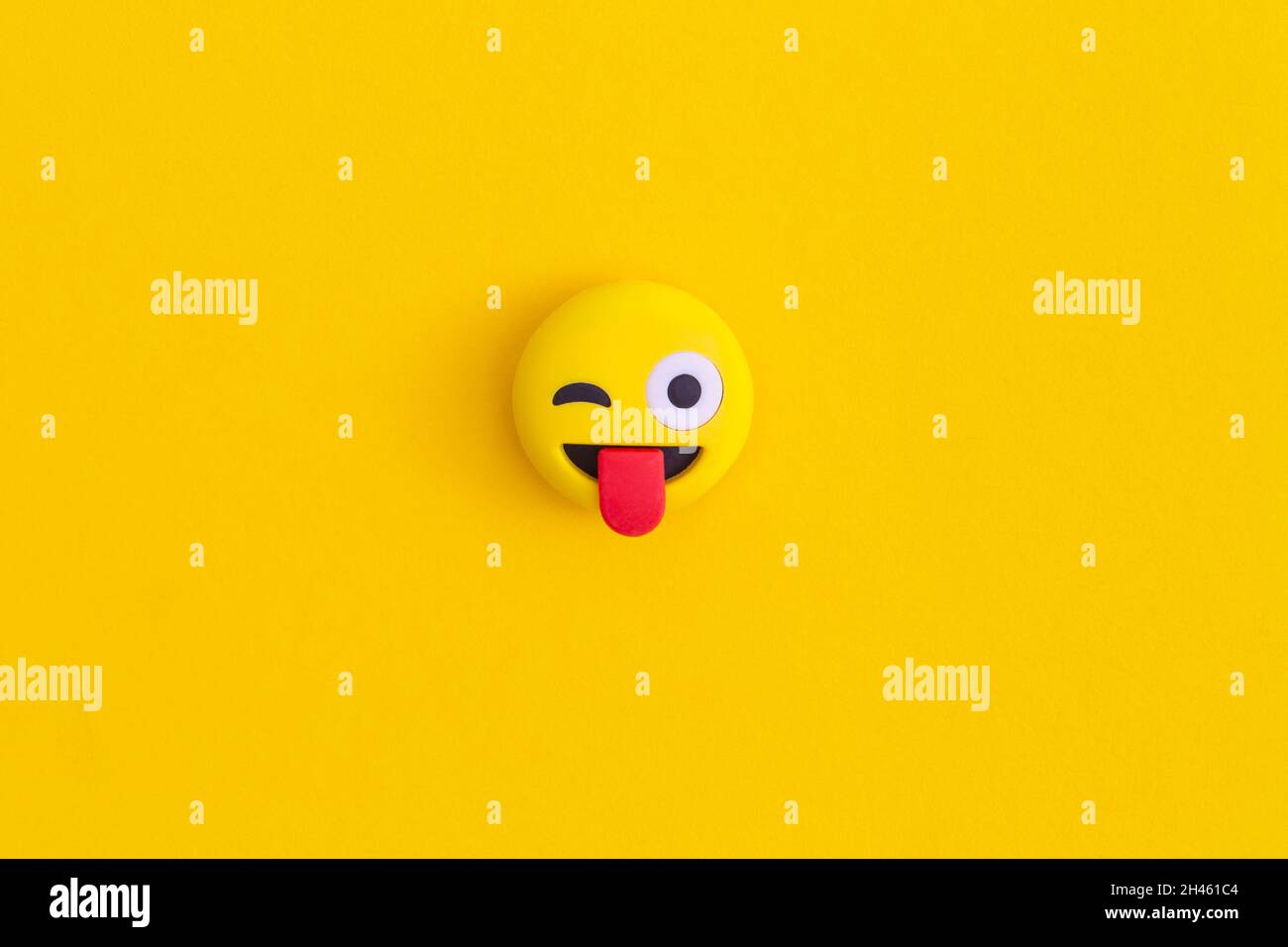Emoticon smile on a yellow background Stock Photo Alamy