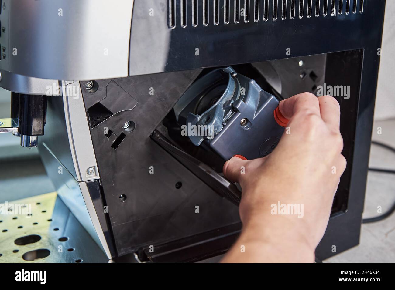 Repairs the coffee machine hires stock photography and images Alamy