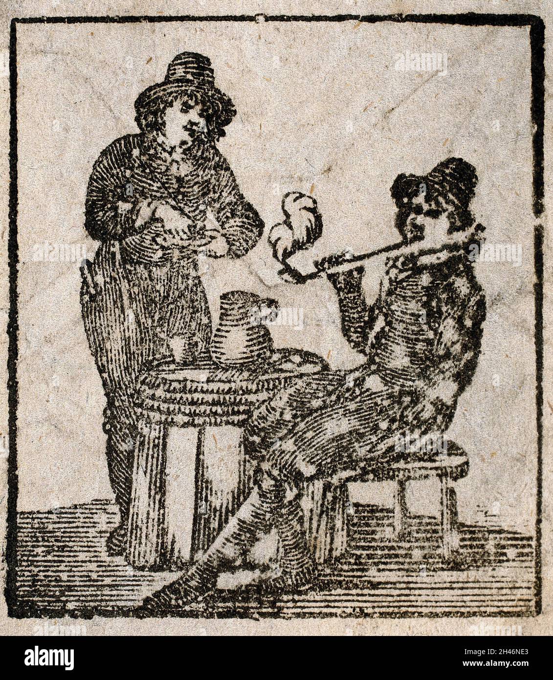 Two men, one of them smoking a pipe. Wood-engraving Stock Photo - Alamy