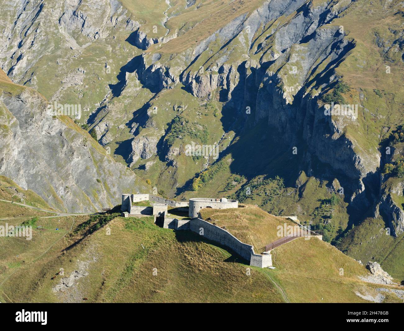 AERIAL VIEW. Military fortification from the late 1800s at an altitude of 2000m in the Tarentaise Valley. Fort de la Platte, Bourg-St-Maurice, France. Stock Photo