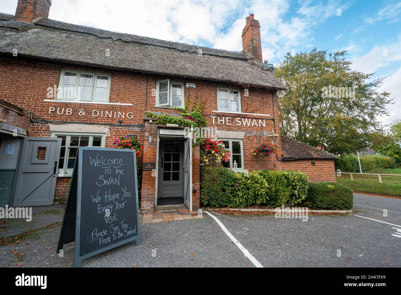 The Swan pub in Sherborne St John village in Hampshire, England, UK