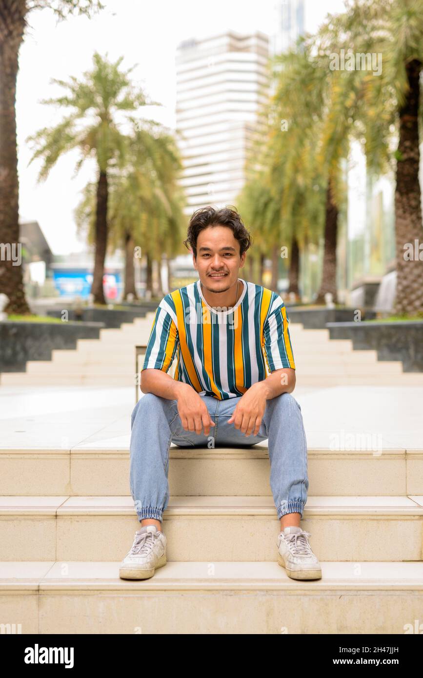 Young man wearing summer shirt hi-res stock photography and images - Alamy