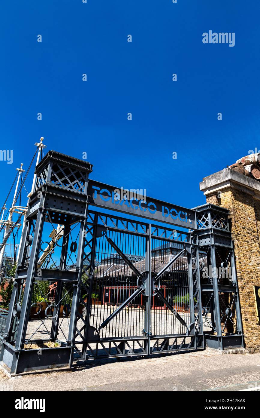 Entrace gate to the London Docks warehouse Tobacco Dock now serving as an event space, Wapping, London, UK Stock Photo