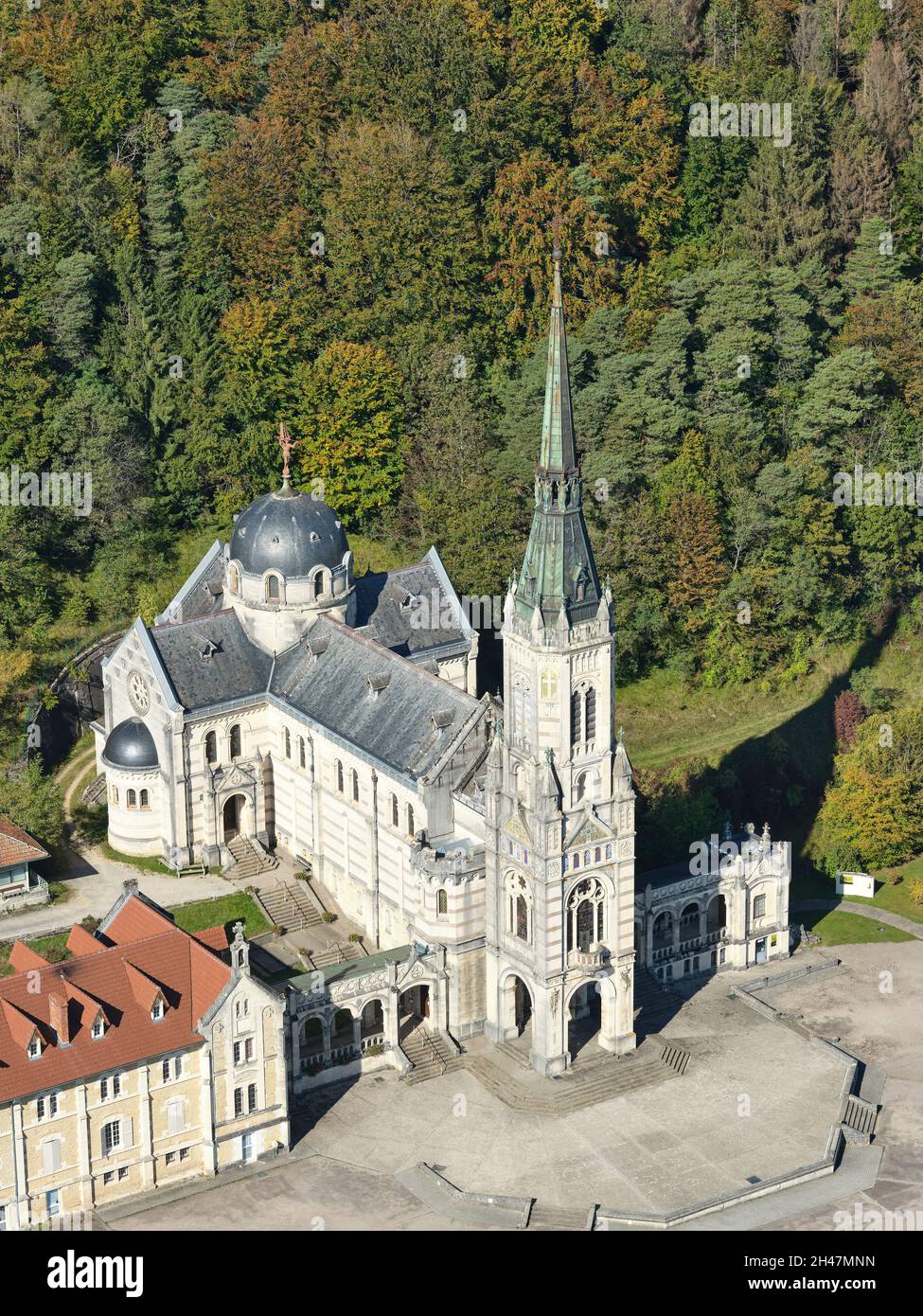 AERIAL VIEW. Basilica of Bois Chenu, built on the site where Joan of Arc heard voices. Domrémy-la-Pucelle, Vosges, Grand Est, France. Stock Photo