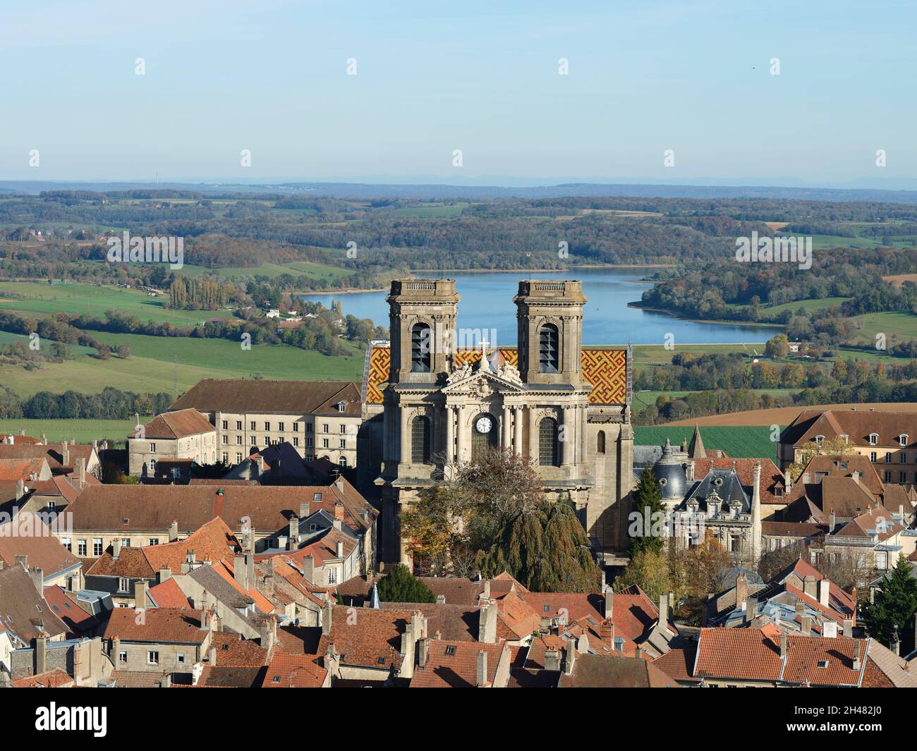 AERIAL VIEW. Cathedral of Saint-Mammès with the Lake Liez in the distance. Langres, Haute-Marne, Grand Est, France. Stock Photo