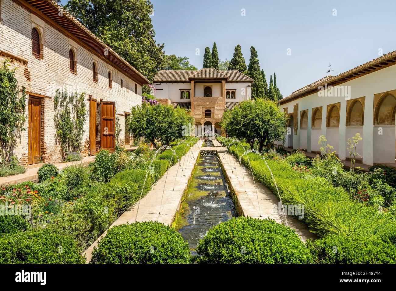 Generalife Moorish palace with green courtyard in Alhambra, Granada, Spain Stock Photo