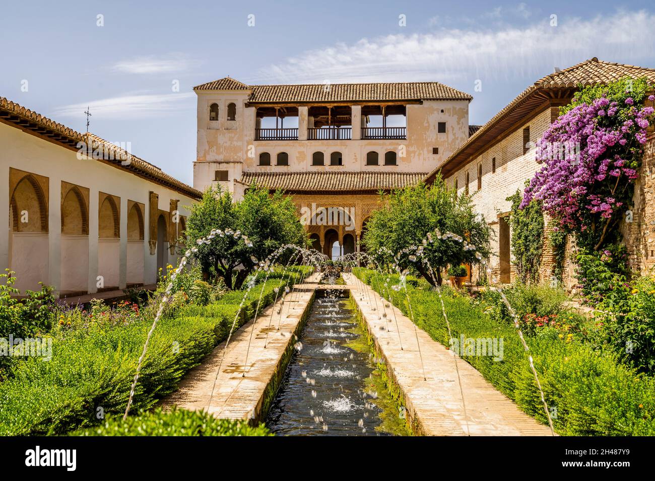 Generalife Moorish palace with green courtyard in Alhambra, Granada, Spain Stock Photo