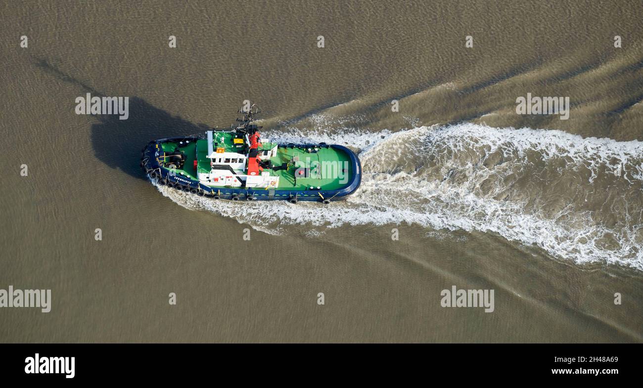 An overhead shot of a Tug Boat, at Seaforth Docks, Liverpool, Merseyside, North West England, UK Stock Photo