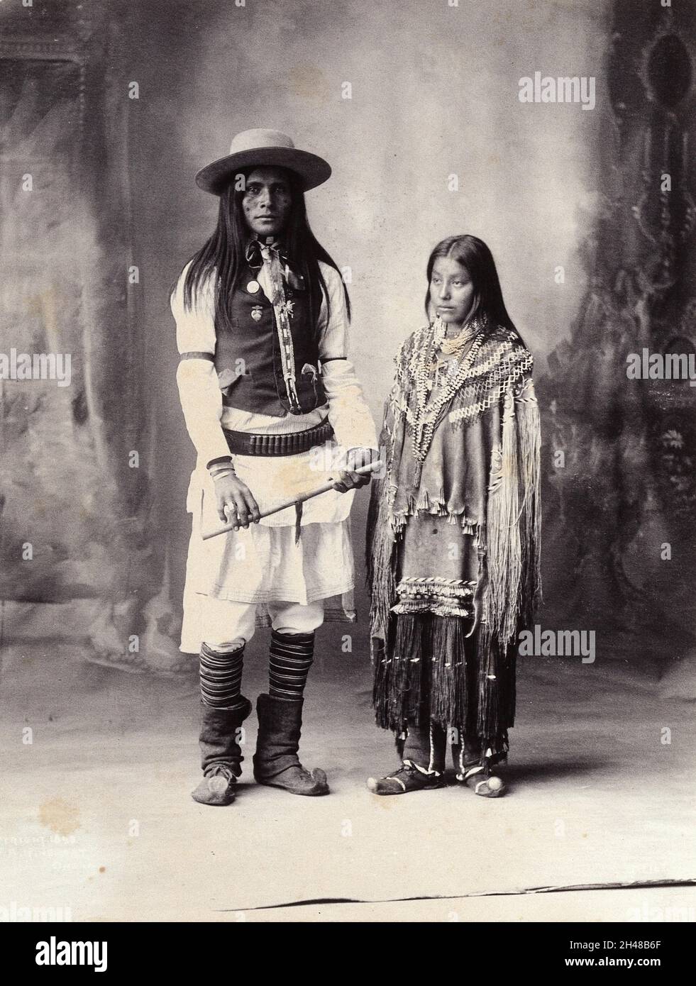 A native American man and woman. Platinum print by F.A. Rinehart, 1898. Stock Photo