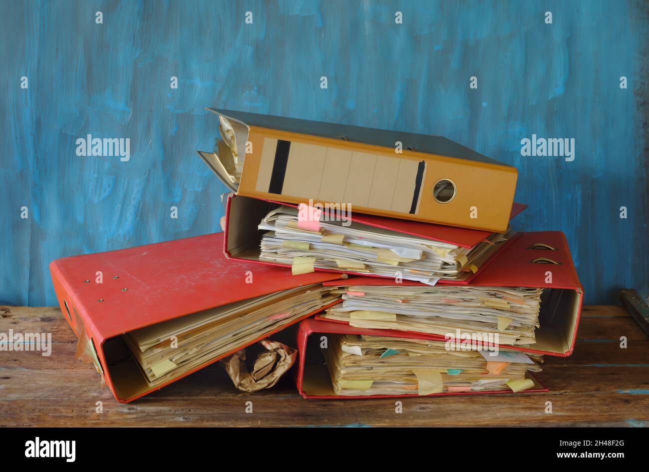 Messy file folders, red tape, bureaucracy, business concept Stock Photo