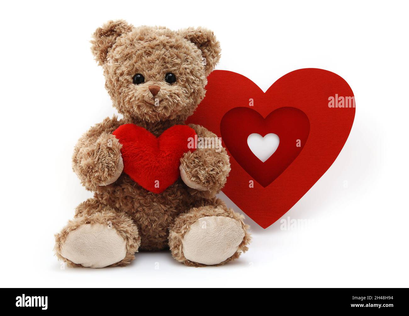 teddy bear with red heart isolated on white background Stock Photo - Alamy