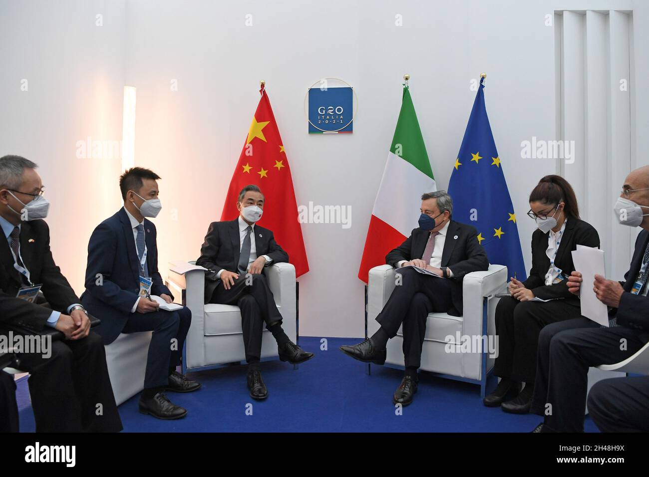 Rome, Italy. 31st Oct, 2021. Italian Prime Minister Mario Draghi (3rd R) meets with visiting Chinese State Councilor and Foreign Minister Wang Yi (3rd L) in Rome, Italy, Oct. 31, 2021. Credit: Jin Mamengni/Xinhua/Alamy Live News Stock Photo
