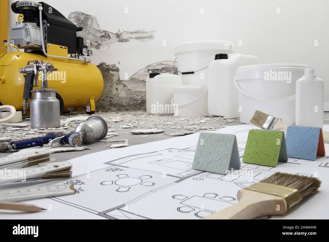 house renovation concept. Compressor with paint spray air gun. Buckets,  jerrycan, products for painting and plastering the home. Samples colors and  br Stock Photo - Alamy