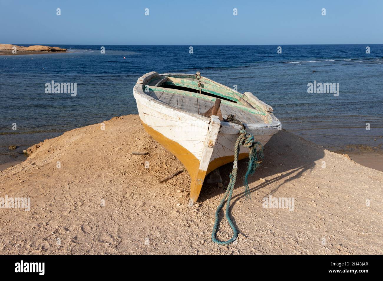 A fishing boat stranded on the shores of the Red Sea, Egypt Stock Photo ...