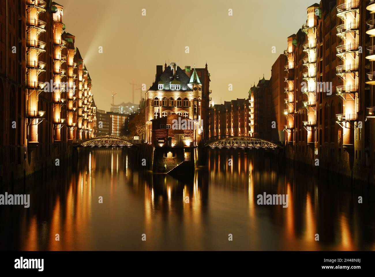 Hamburg warehouse district city water castle by night Stock Photo