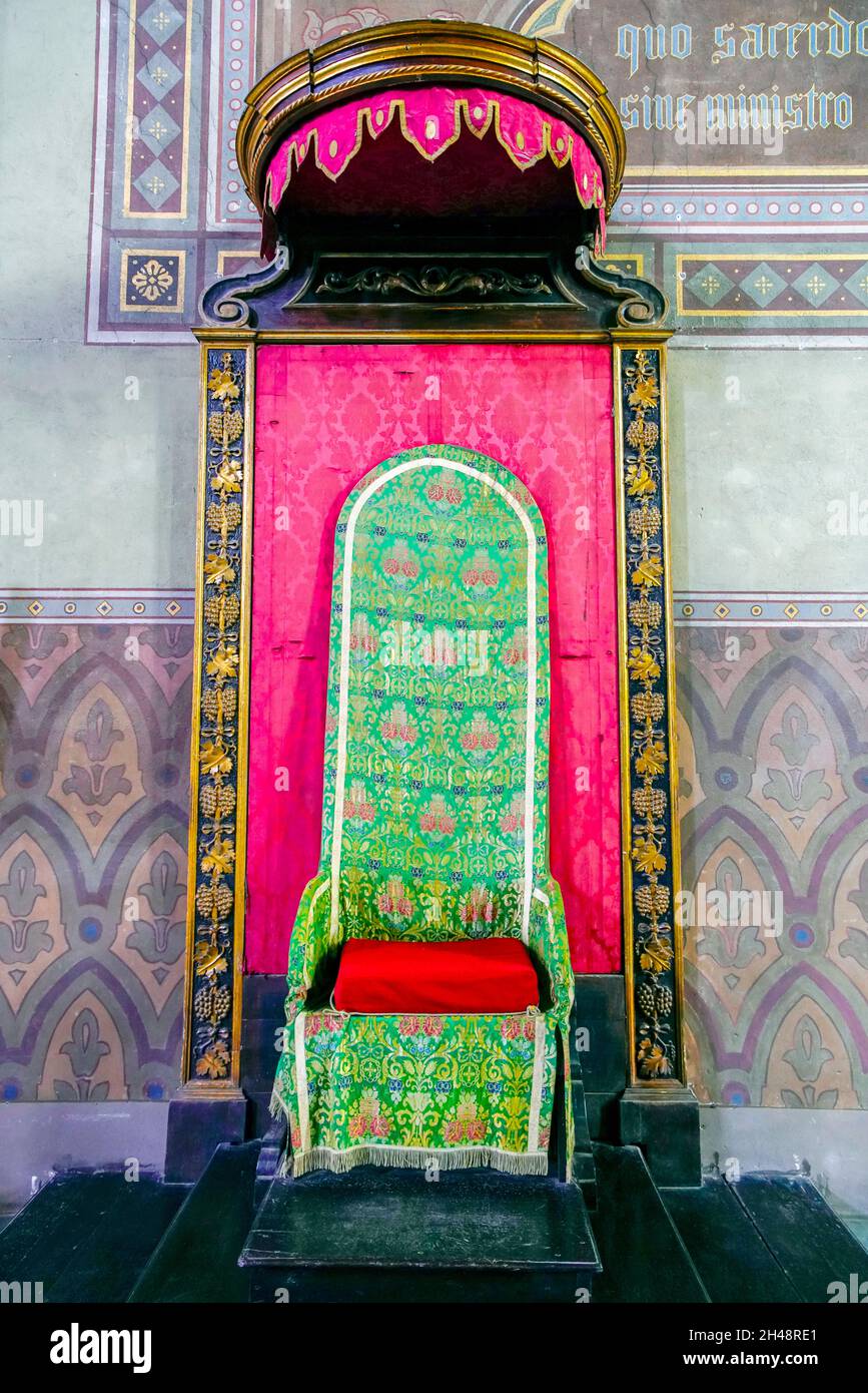 Bishop's throne in the Cathedral of San Lorenzo in Alba, Piedmonte Region, Italy. The cathedral is located in the eastern sector of the ancient city o Stock Photo