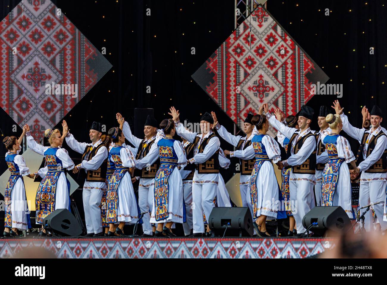 Romanian People in folkloric dress at the folkloric festival in Sibiu in Romania, August 07, 2021 Stock Photo