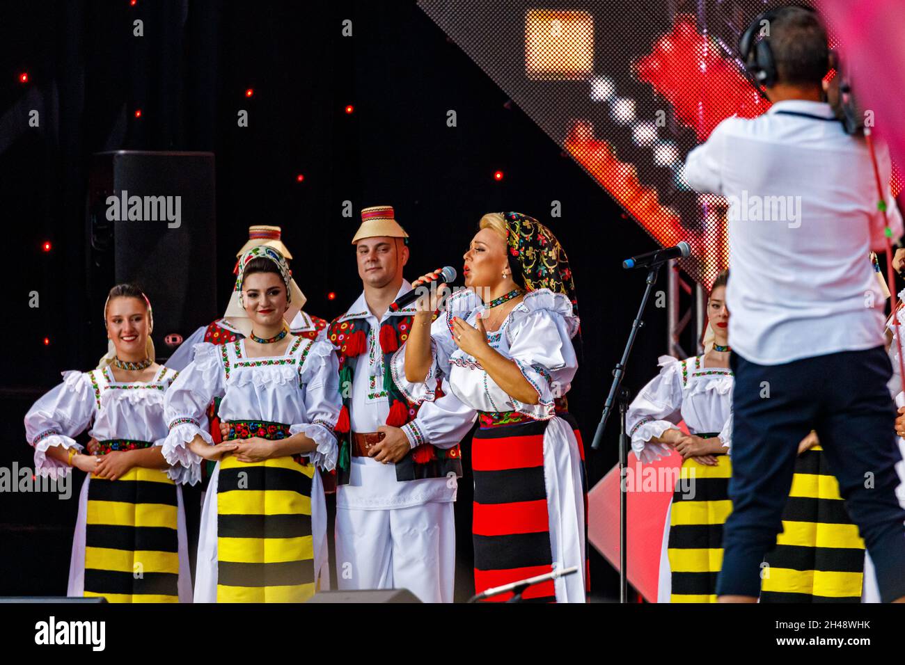 Romanian People in folkloric dress at the folkloric festival in Sibiu in Romania, August 07, 2021 Stock Photo