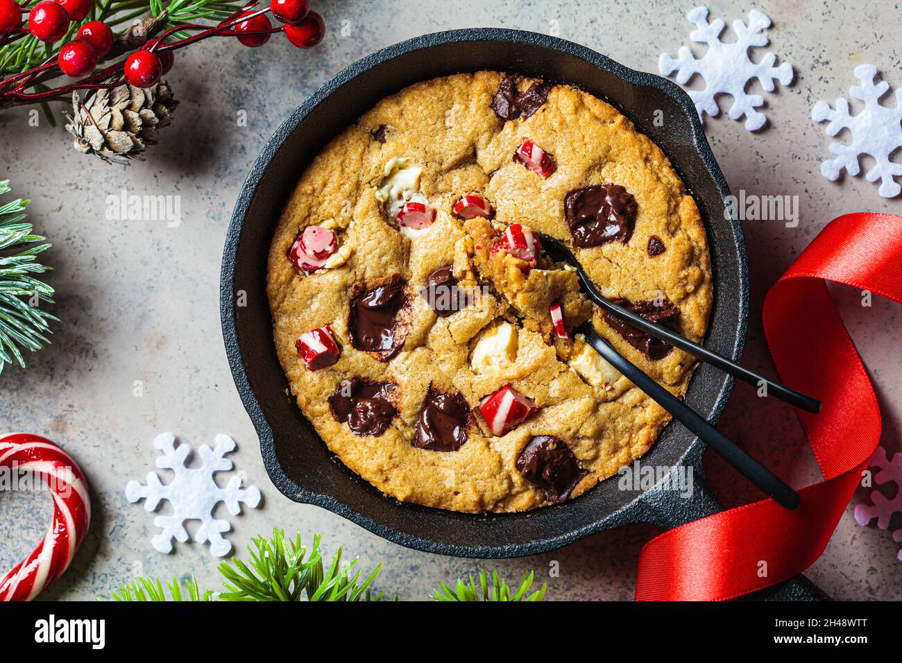 Christmas breakfast. Giant cookies with dark and white chocolate in a