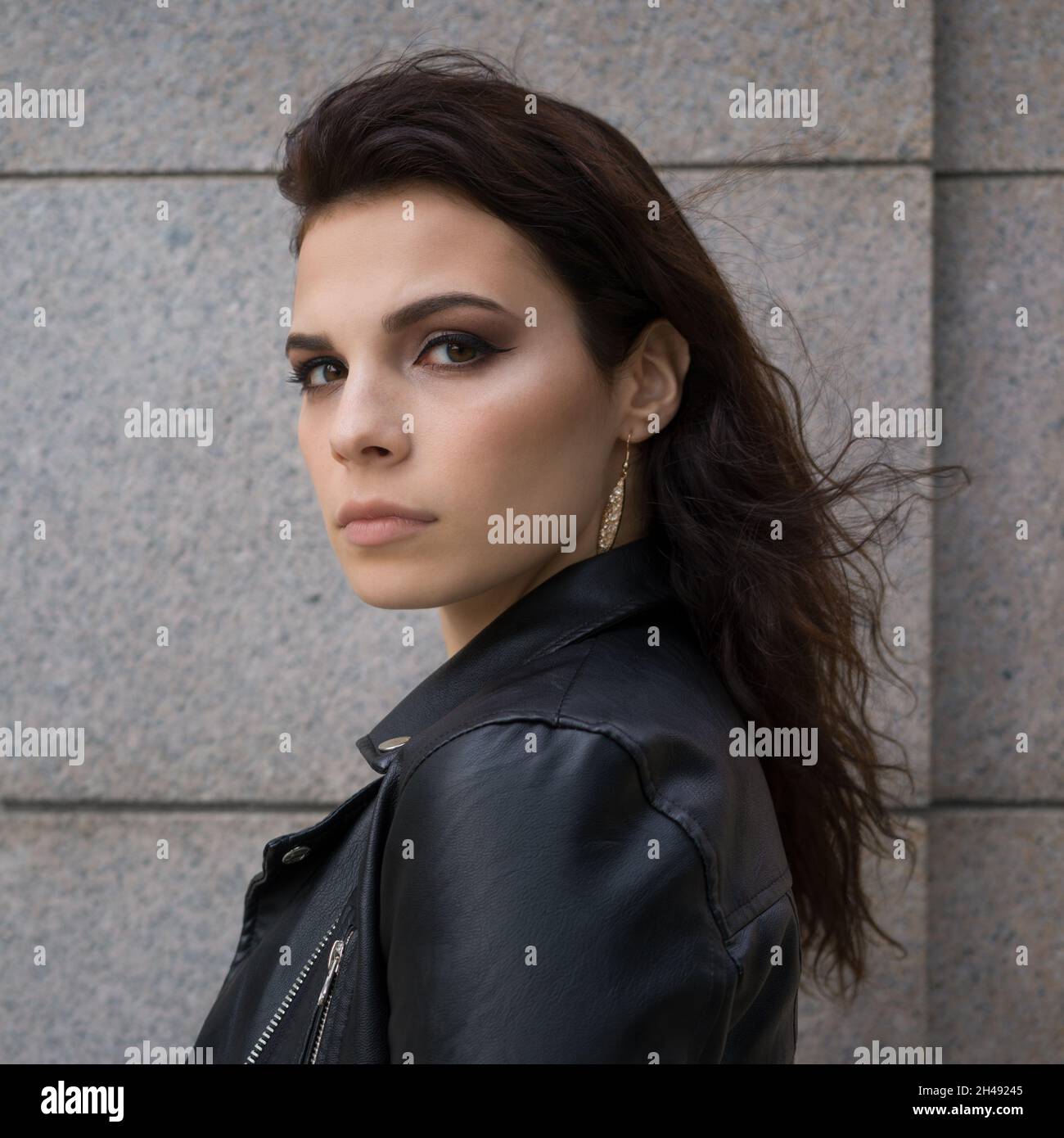 Woman in black leather jacket hi-res stock photography and images - Alamy