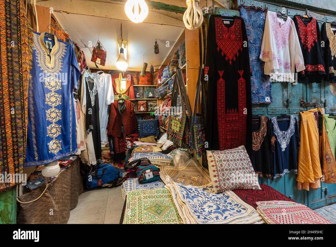 Store of colorful national costumes in the old city of Jerusalem ...