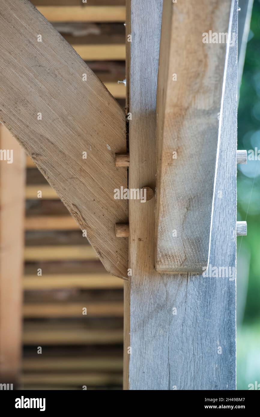 Timber frame mortise and tenon joints with hardwood pegs Stock Photo