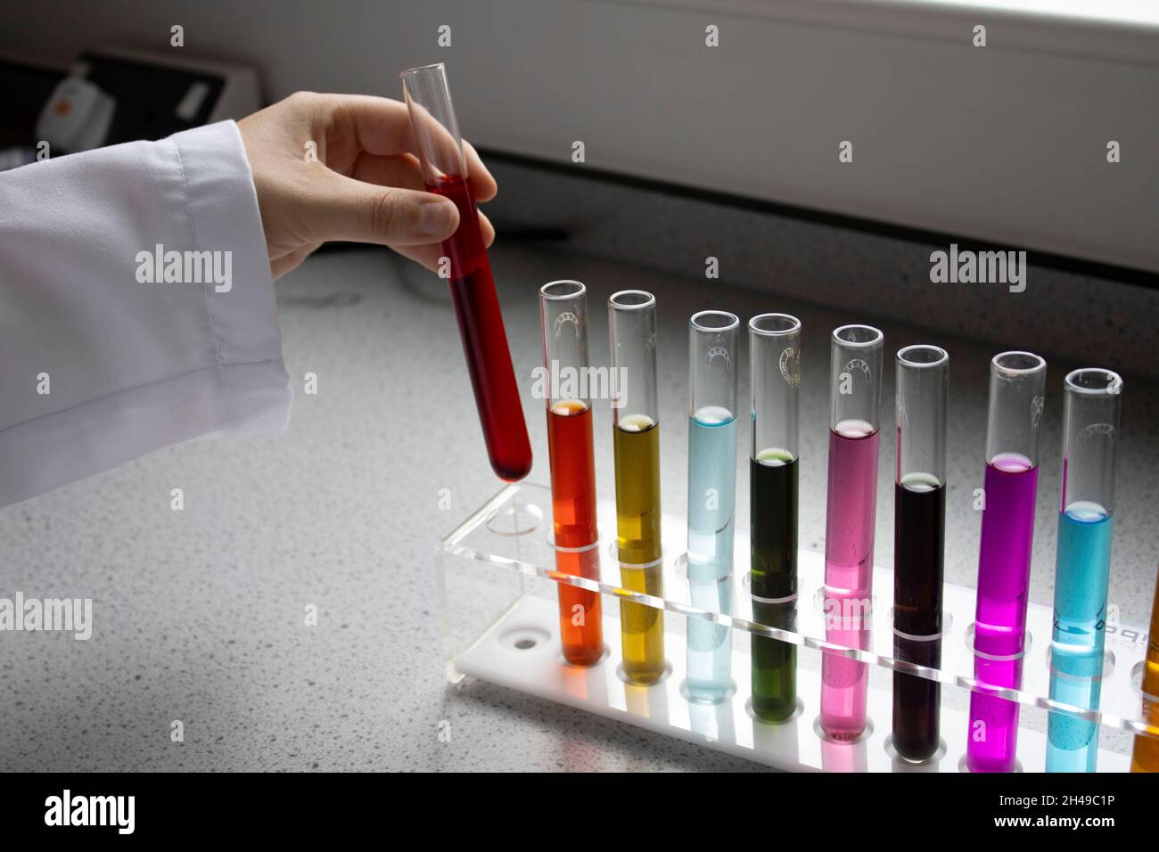 Science test tubes being used Stock Photo Alamy