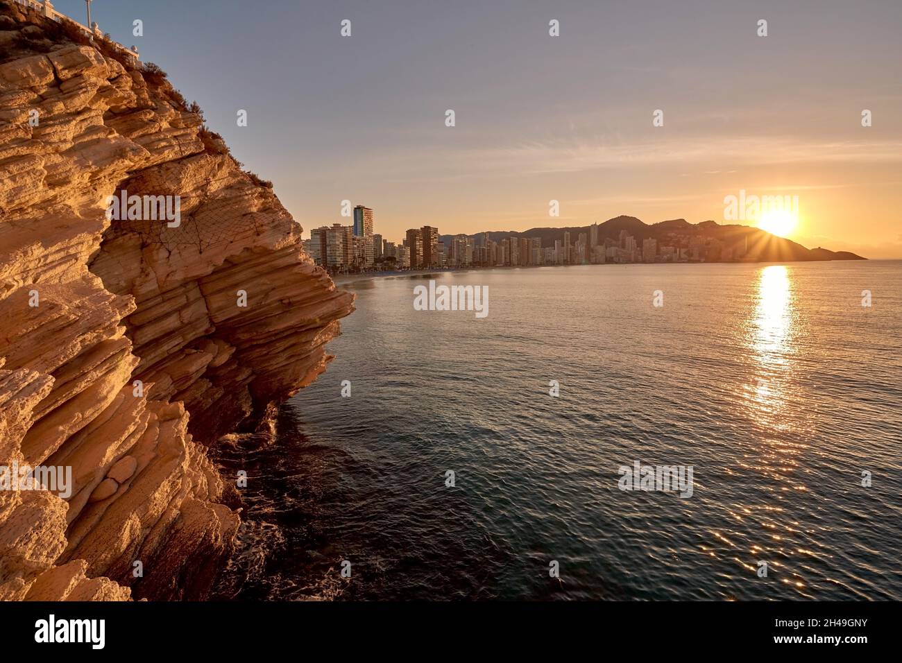 Sunrise over Benidorm city , panorama of city with skyscrapers. Levante beach, Benidorm in Spain Stock Photo