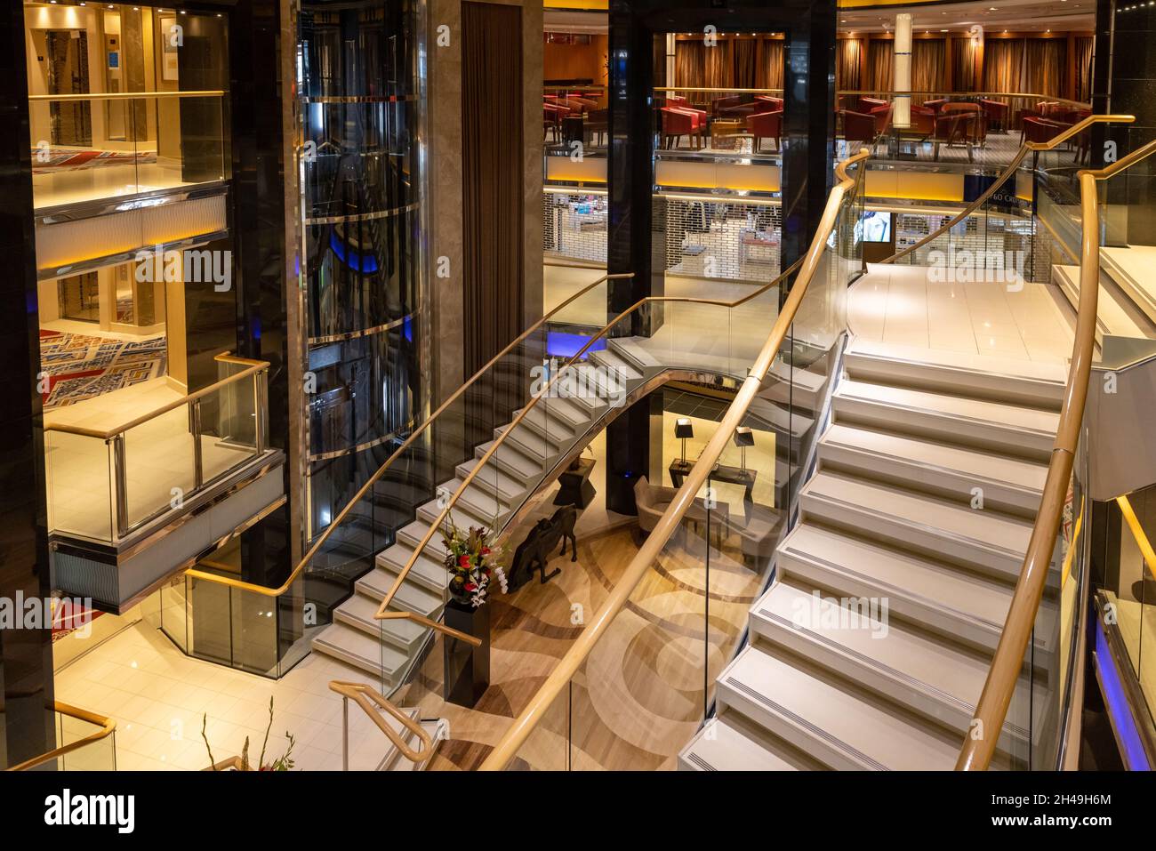 Southampton, UK - 30th September 2021: The luxury P and O cruise ship Ventura. Interior shot of the glass atrium and stairways in the centre or the sh Stock Photo