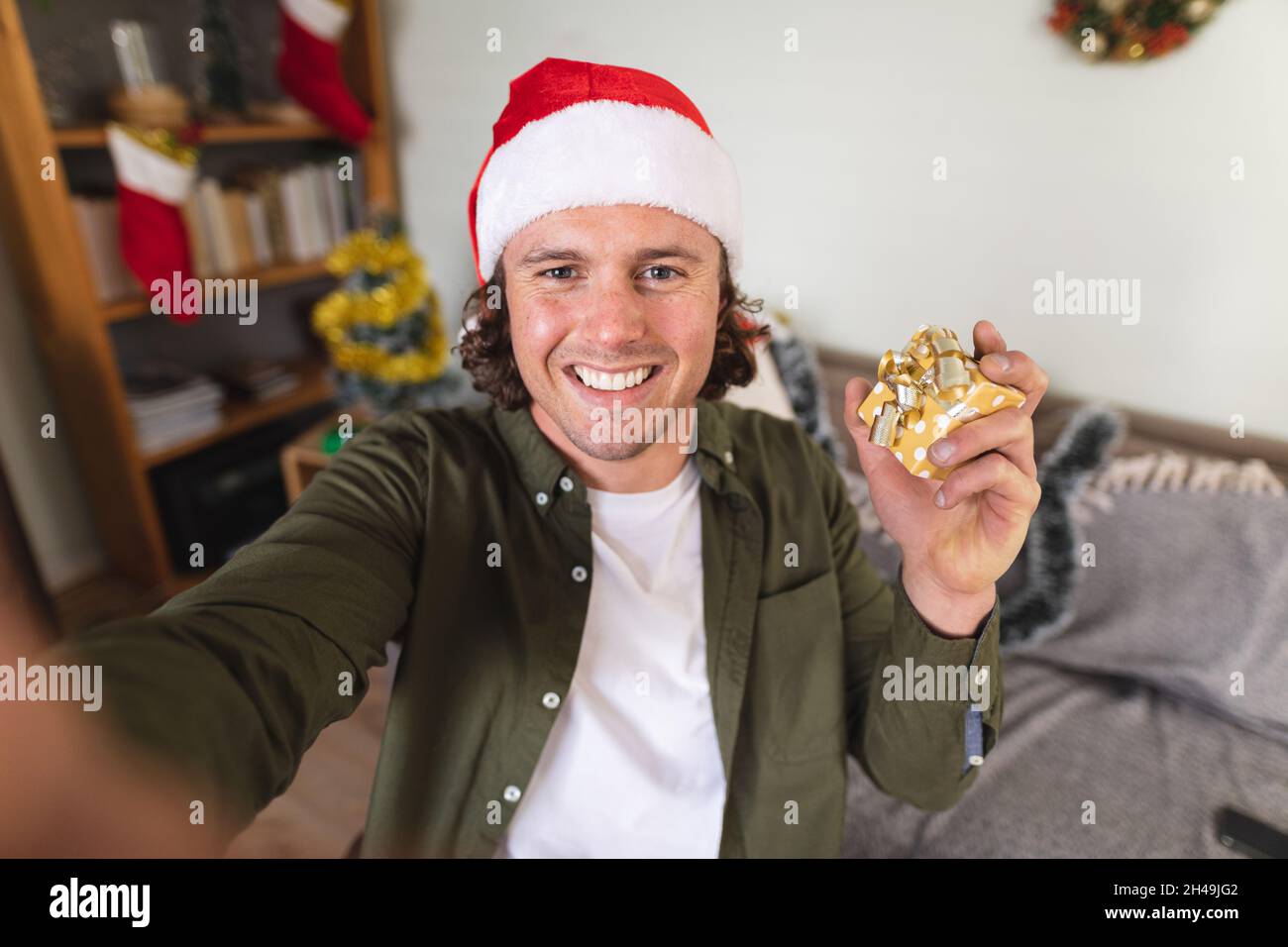 Wearing a santa hat hi-res stock photography and images - Alamy