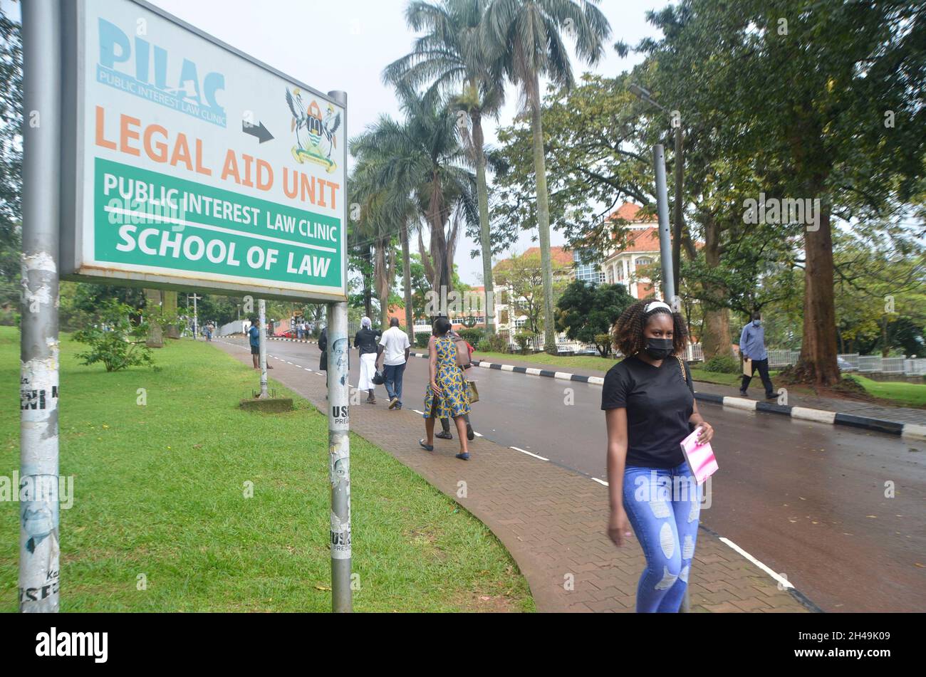(211101) -- KAMPALA, Nov. 1, 2021 (Xinhua) -- A student wearing a face mask walks in Makerere University in Kampala, Uganda, Nov. 1, 2021. Institutions of higher learning in Uganda reopened on Monday following their closure in June this year due to the COVID-19 pandemic. (Photo by Nicholas Kajoba/Xinhua) Stock Photo