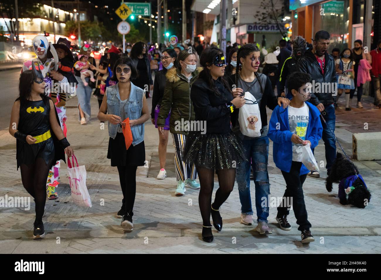 Bogota, Colombia, October 31, 2021. People walk out into town in
