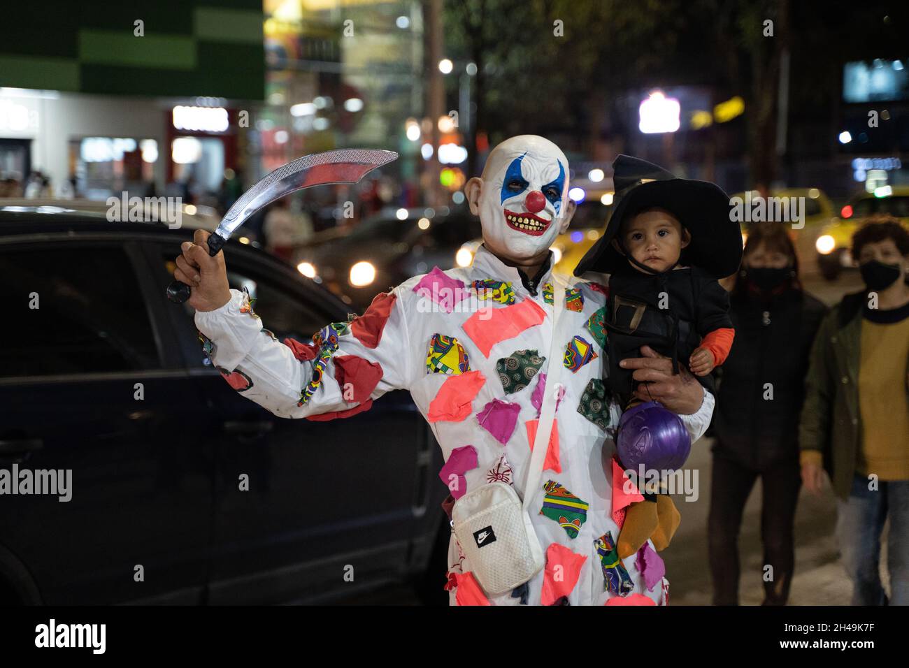 Bogota, Colombia, October 31, 2021. People walk out into town in