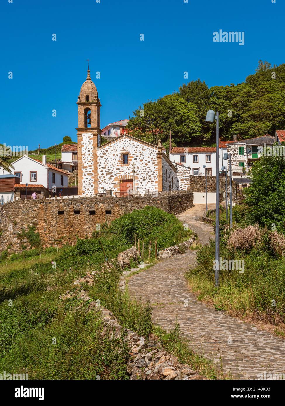 Beautiful church against blue sky. View of San Andrés de Teixido sanctuary in Galicia, Spain Stock Photo