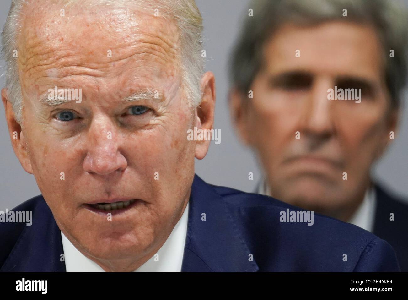 U.S. President Joe Biden and U.S. Climate Adviser John Kerry attend an event on action and solidarity at the UN Climate Change Conference (COP26) in Glasgow, Scotland, Britain, November 1, 2021. REUTERS/Kevin Lamarque/Pool Stock Photo