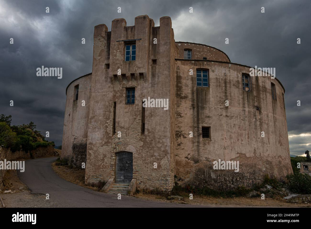 The Citadel at Saint Florent ,corsica France .against a dramatic sky ,holiday destinations . Stock Photo