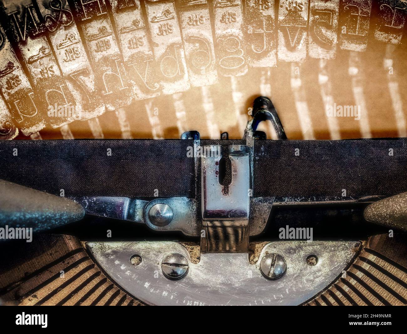 Typewriter with type bars in the background Stock Photo