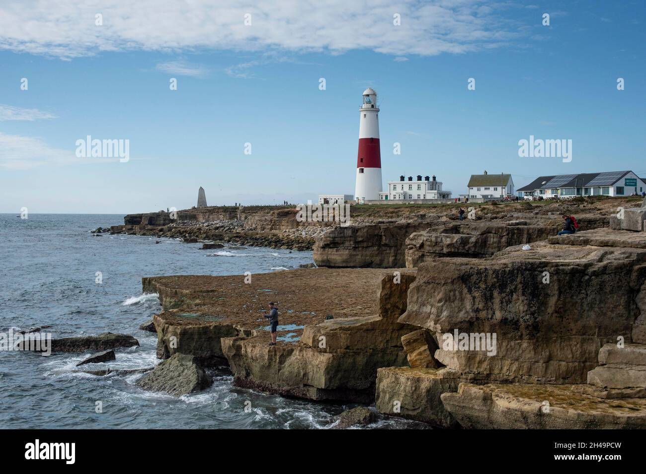 The lighthouse at Portland Bill  and The Lobster Pot cafe and restaurant on the Isle of Portland Dorset England UK Stock Photo
