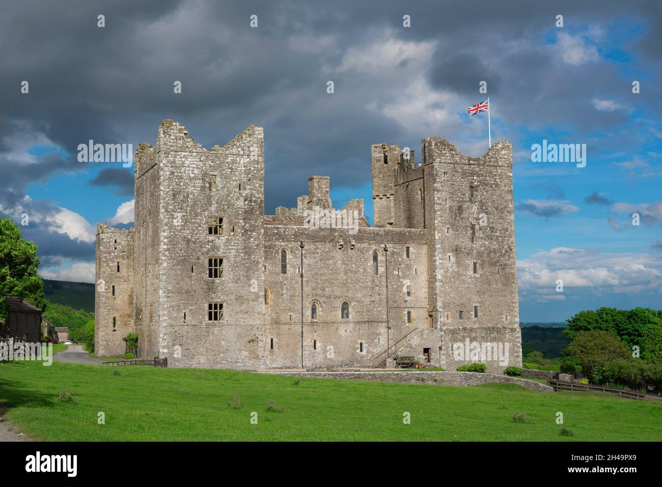 Bolton Castle Yorkshire, view in dramatic weather of Bolton Castle, a historic medieval fortress sited in the centre of the Yorkshire Dales, England Stock Photo