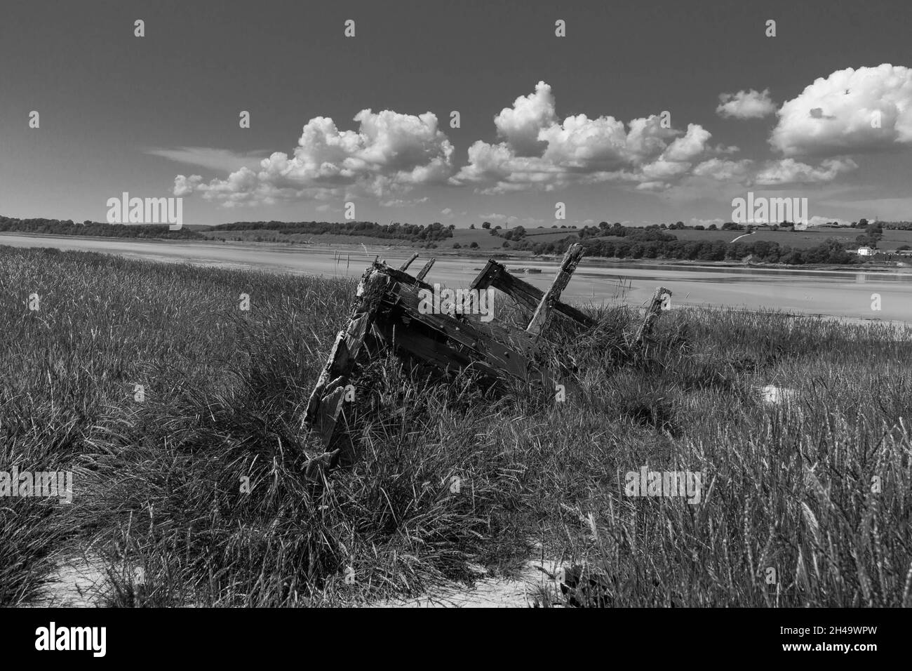 The decayed hull of a ship, Purton ships graveyard on the Severn estuary Gloucestershire UK. July 2021 Stock Photo